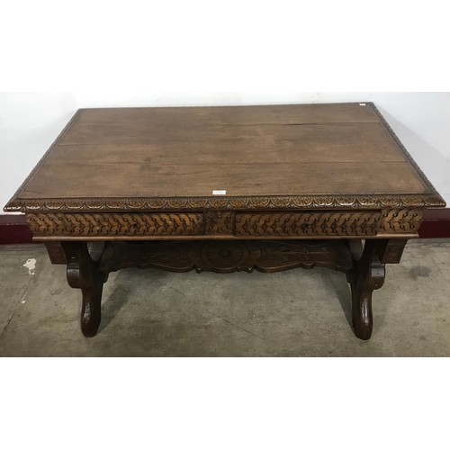 113 - An 18th Century style Italian carved walnut two drawer centre table