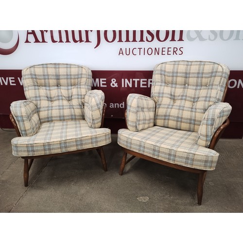 93 - A pair of Ercol Golden Dawn beech Windsor armchairs