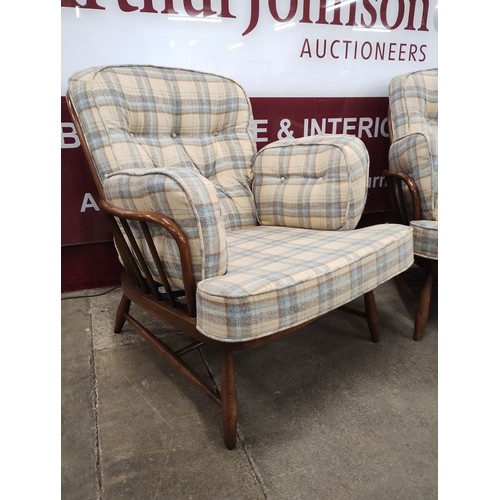 93 - A pair of Ercol Golden Dawn beech Windsor armchairs