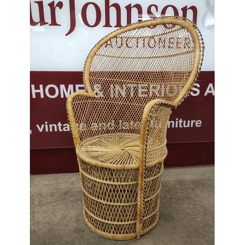 104 - An Italian wicker peacock chair