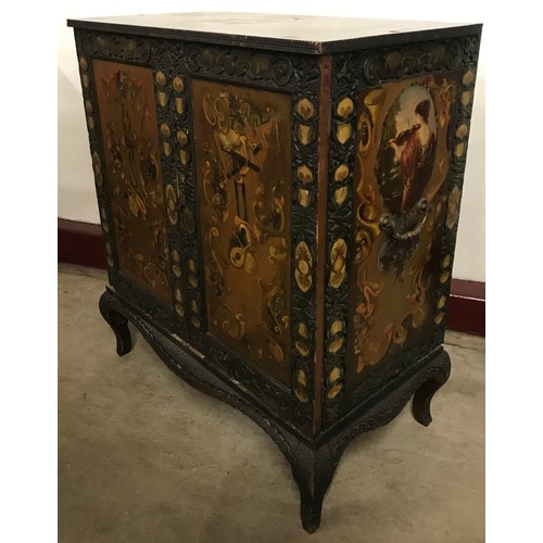 147 - An Italian Renaissance style painted mahogany two door cupboard