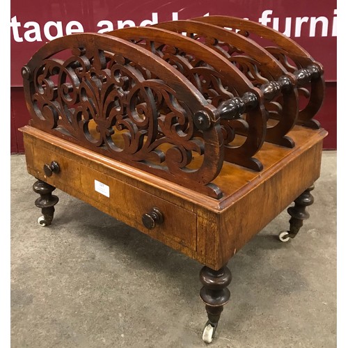 151 - A Victorian walnut fretwork Canterbury