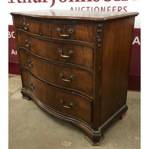 120 - A George III style mahogany serpentine chest of drawers