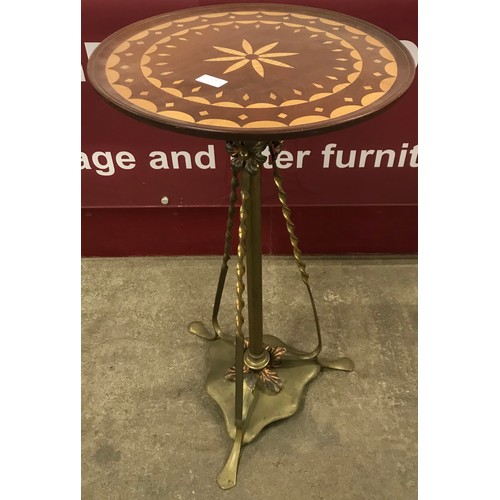 121 - A Victorian Aesthetic Movement inlaid walnut circular occasional table, on copper and brass stand