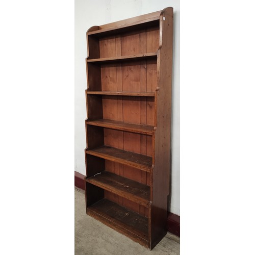 154 - A Victorian mahogany open waterfall front bookcase