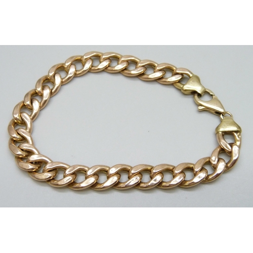 7001 - A 9ct gold curb link bracelet, 11.2g, 21.3cm