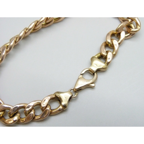 7001 - A 9ct gold curb link bracelet, 11.2g, 21.3cm