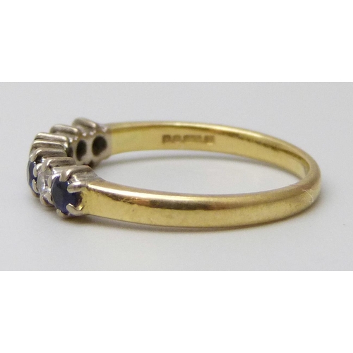 7021 - An 18ct gold, sapphire and diamond ring, 2.3g, L