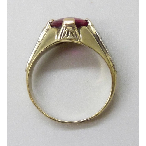 7040 - A 14k gold cabochon ruby ring, 6.6g, M