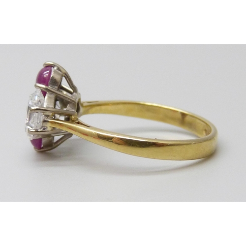 7044 - An 18ct gold, cabochon ruby and white stone ring, 3.9g, N