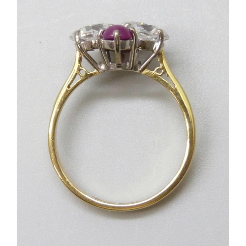 7044 - An 18ct gold, cabochon ruby and white stone ring, 3.9g, N