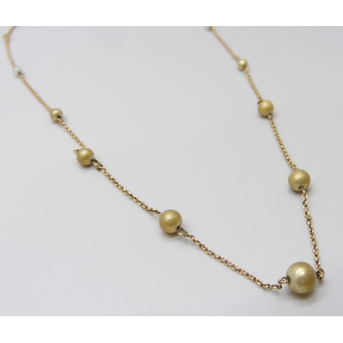 7049 - A 9ct gold and faux pearl necklace, 2.7g, 40.5cm, coating on pearls a/f