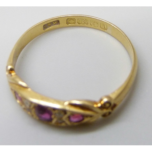 7053 - An 18ct gold, ruby and diamond ring, Birmingham 1908, boxed, 2.7g, Q