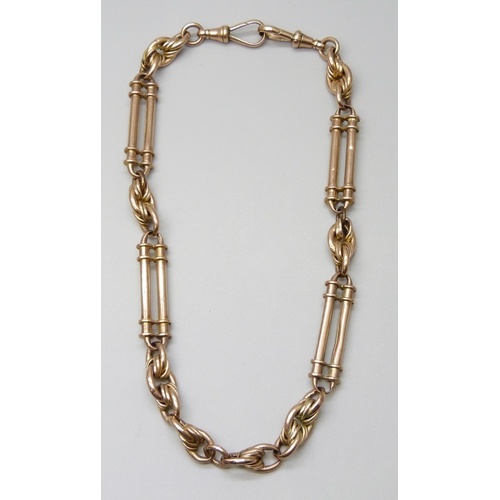 7056 - A 9ct gold fancy link Albert chain, 38g, 38.5cm