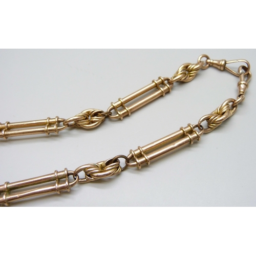 7056 - A 9ct gold fancy link Albert chain, 38g, 38.5cm