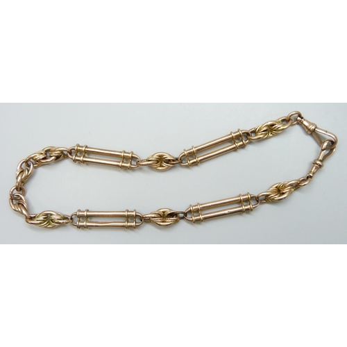 7056 - A 9ct gold fancy link Albert chain, 38g, 38.5cm