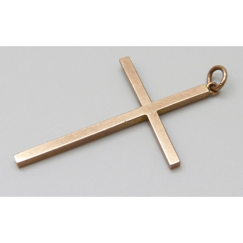 7057 - A 9ct gold cross pendant, 3.1g, 4cm