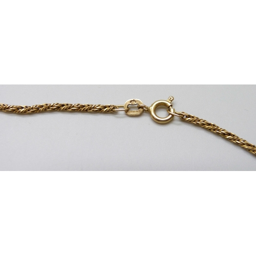 7058 - A 9ct gold rope chain necklace, 5.6g, 50cm