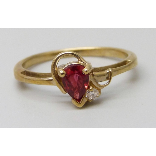 7063 - A 9ct gold ruby and diamond ring, 1.8g, N