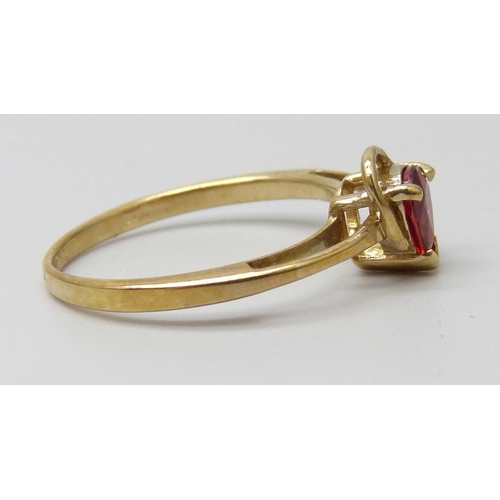 7063 - A 9ct gold ruby and diamond ring, 1.8g, N