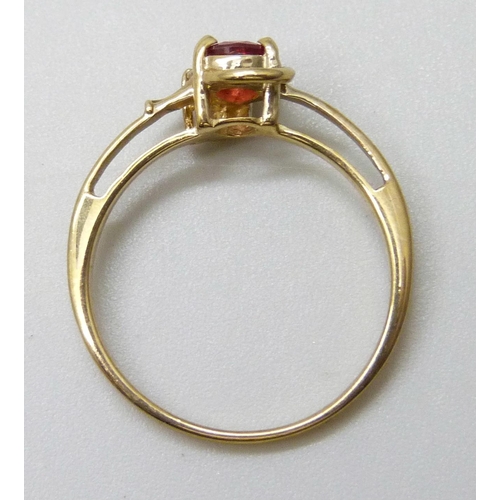 7063 - A 9ct gold ruby and diamond ring, 1.8g, N