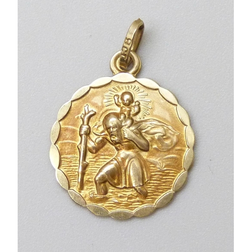 7064 - A 9ct gold St Christopher pendant, 1.4g, 2cm including bale