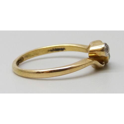 7067 - An 18ct gold, sapphire and diamond ring, 2.4g, M