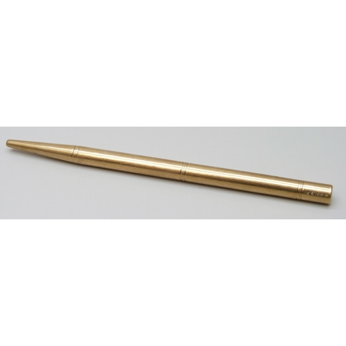 7073 - A 9ct gold propelling pencil, 15.9g total weight, 10.8cm