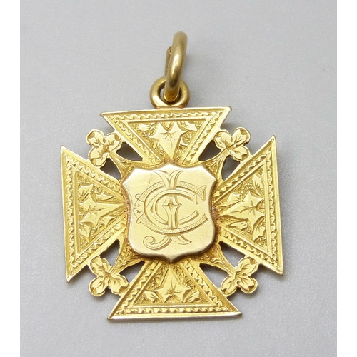 7074 - A Victorian 18ct gold fob medal with inscription dated 1894, 8.5g