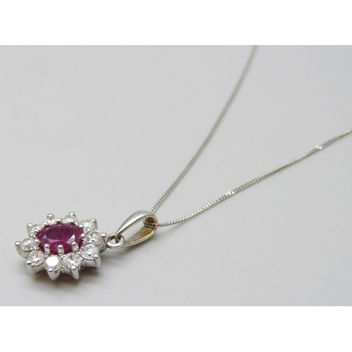 7082 - An 18ct white gold ruby and diamond pendant, approximately .40ct diamonds, on a 9ct white gold chain... 