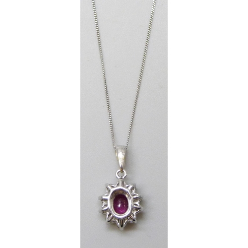 7082 - An 18ct white gold ruby and diamond pendant, approximately .40ct diamonds, on a 9ct white gold chain... 