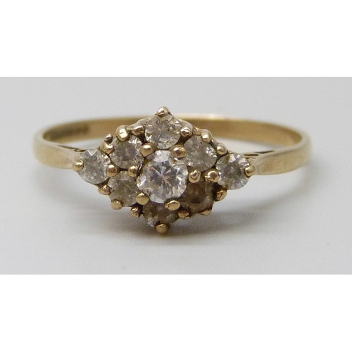 7085 - A 9ct gold and diamond cluster ring, 2.1g, J, and a 9ct gold and white stone ring, 1.6g, Q