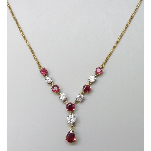 7089 - An 18ct yellow and white gold, ruby and diamond articulated necklet on a yellow gold spiga chain com... 