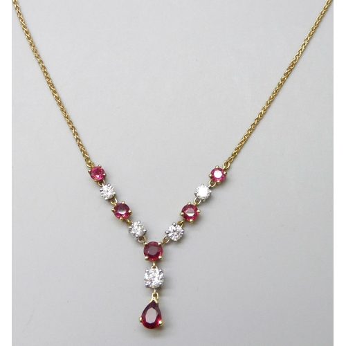 7089 - An 18ct yellow and white gold, ruby and diamond articulated necklet on a yellow gold spiga chain com... 