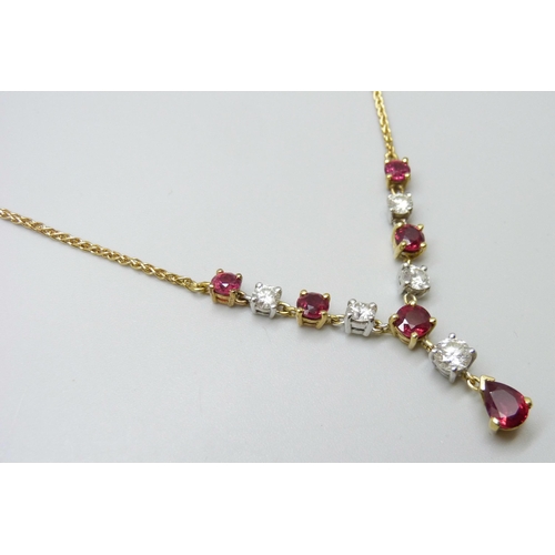 7089 - An 18ct yellow and white gold, ruby and diamond articulated necklet on a yellow gold spiga chain com... 