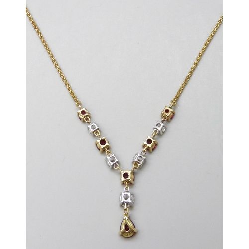 7089 - An 18ct yellow and white gold, ruby and diamond articulated necklet on a yellow gold spiga chain com... 