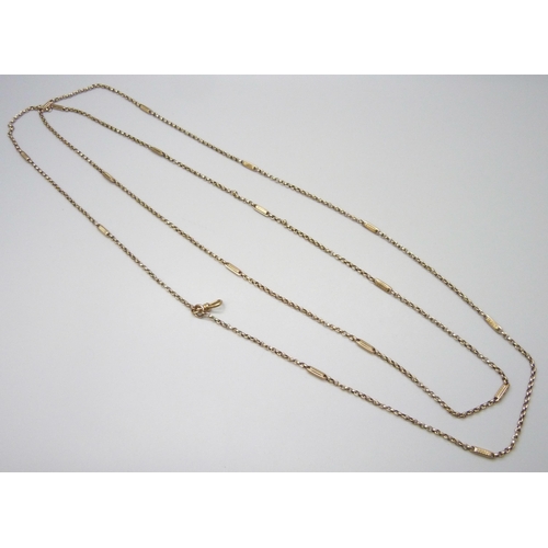 7092 - A yellow metal fancy link long guard chain, 28g, 170cm