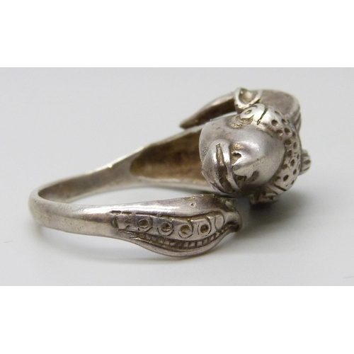 7095 - A .800 silver and enamel ram's head ring, R/S, and a repaired white metal ring set with a pink stone... 