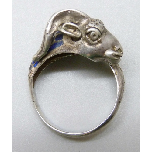 7095 - A .800 silver and enamel ram's head ring, R/S, and a repaired white metal ring set with a pink stone... 