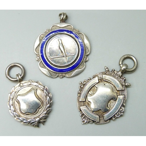 7096 - A silver and enamel bird fob and two others, one with inscription, 28g