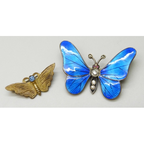 7097 - An early 20th Century enamelled butterfly brooch set with seed pearls, another butterfly brooch and ... 