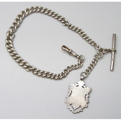 7103 - A silver curb link watch chain with a silver fob, 51g, 30cm to T bar including clip