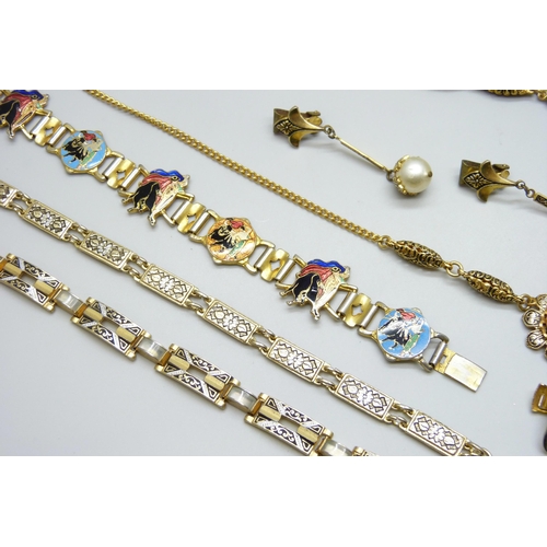 7146 - A collection of costume jewellery including enamelled