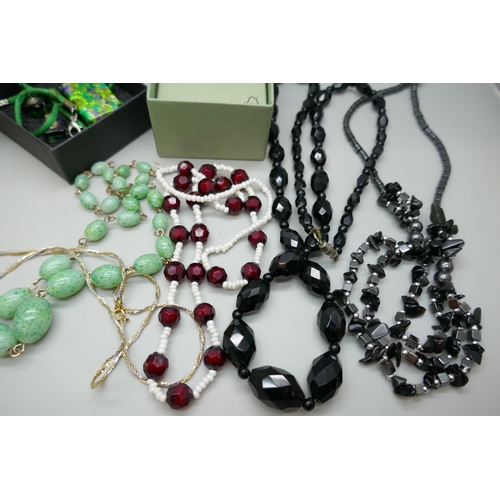 7150 - A collection of semi precious stone jewellery, silver earrings, Ronson Wedgwood lighter, etc. *This ... 