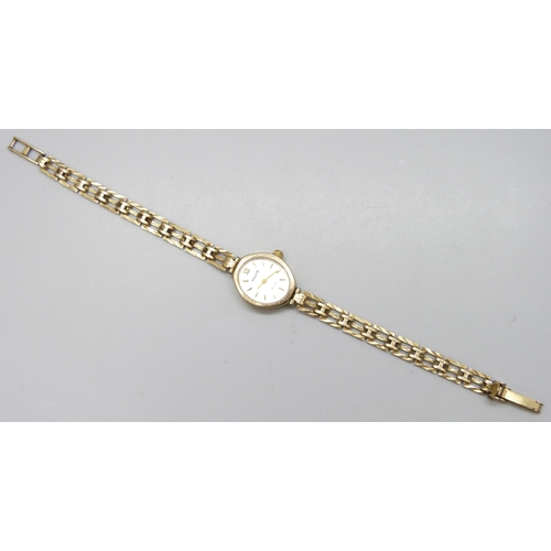 7179 - A 9ct gold Accurist lady's wristwatch on a 9ct gold strap, 10.1g including movement