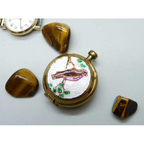 7182 - A collection of jewellery including a silver enamelled brooch, a gold plated Victorian locket, tiger... 