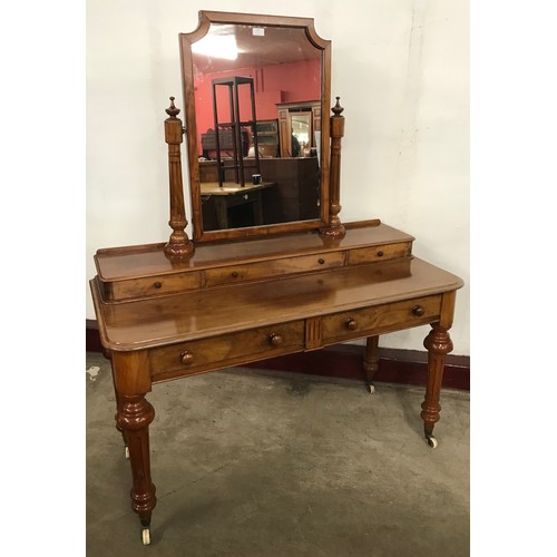 130 - A Victorian walnut dressing table