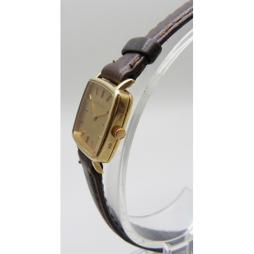 7196 - A 9ct gold cased Garrard wristwatch with inscription to case back, 21mm including crown