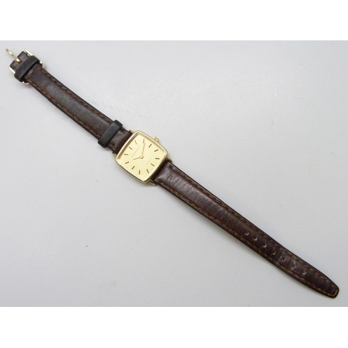 7196 - A 9ct gold cased Garrard wristwatch with inscription to case back, 21mm including crown