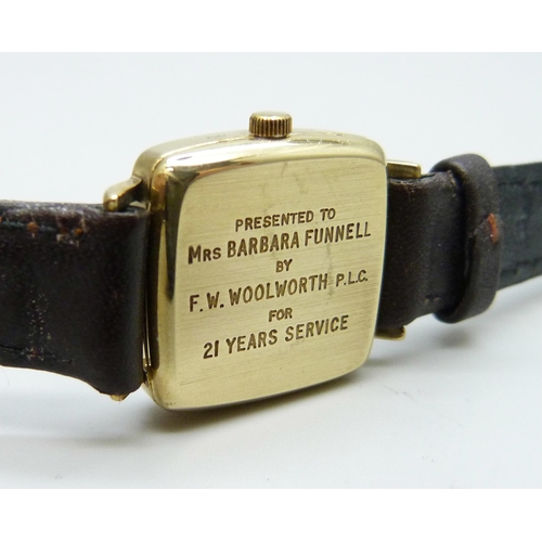 7196 - A 9ct gold cased Garrard wristwatch with inscription to case back, 21mm including crown